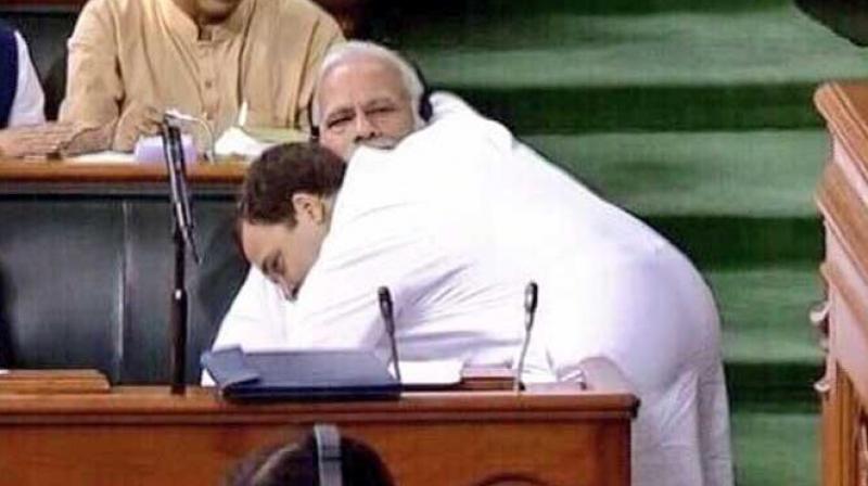 Rahul catches Modi by surprise and hugs him Rahul catches Modi by surprise and hugs him