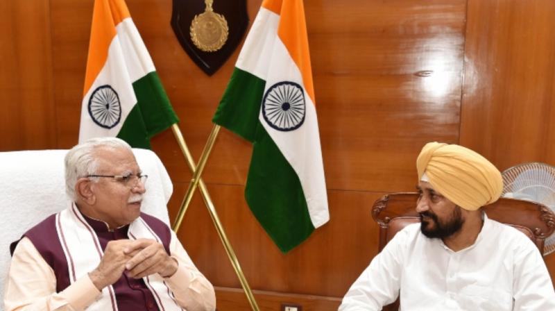 Haryana's Chief Minister Manohar Lal Khattar with Punjab Chief Minister Charanjit Singh Channi