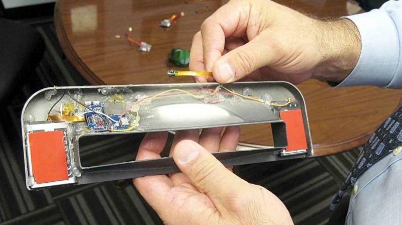 2 Romanians held for installing skimming device at ATM 2 Romanians held for installing skimming device at ATM