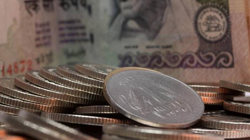 Rupee retreats from 1 month-high Rupee retreats from 1 month-high