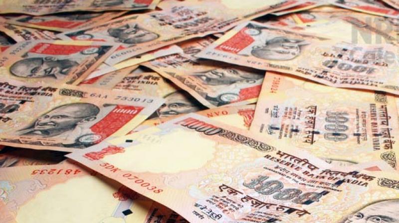 3 held with Rs 1.43 cr demonetised currency 3 held with Rs 1.43 cr demonetised currency