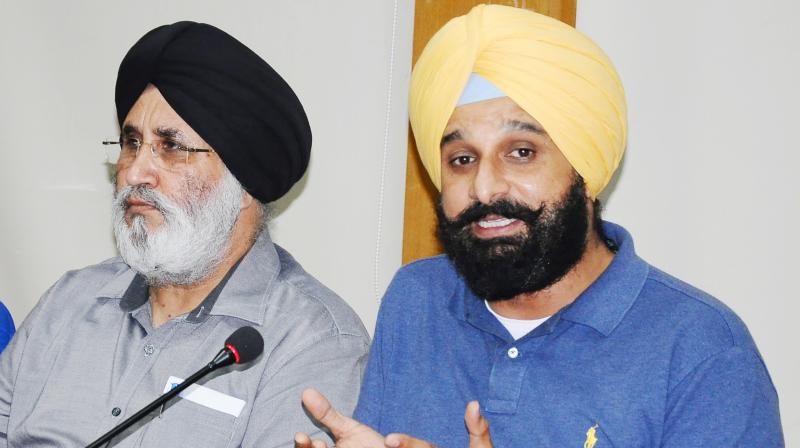 Bikram Sigh Majithia and Daljeet Singh Cheema Bikram Sigh Majithia and Daljeet Singh Cheema
