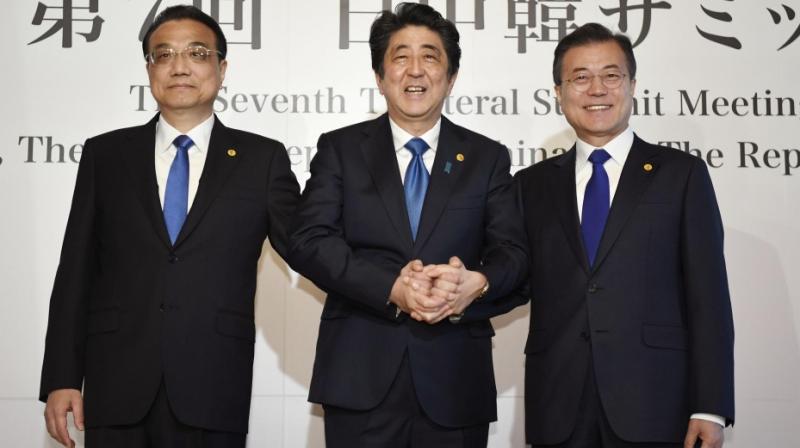 Japan, China, South Korea agree to cooperate toward nuke-free North Korea