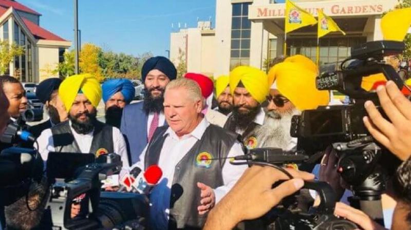 Doug Ford with Sikh community members Doug Ford with Sikh community members