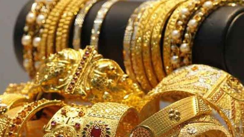 Gold climbs Rs 130 on festive demand Gold climbs Rs 130 on festive demand
