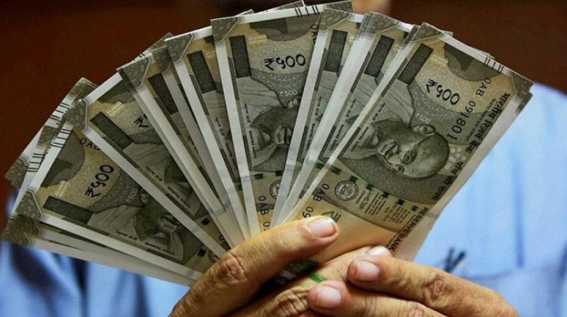 Rupee zooms 55 paise to 73.57