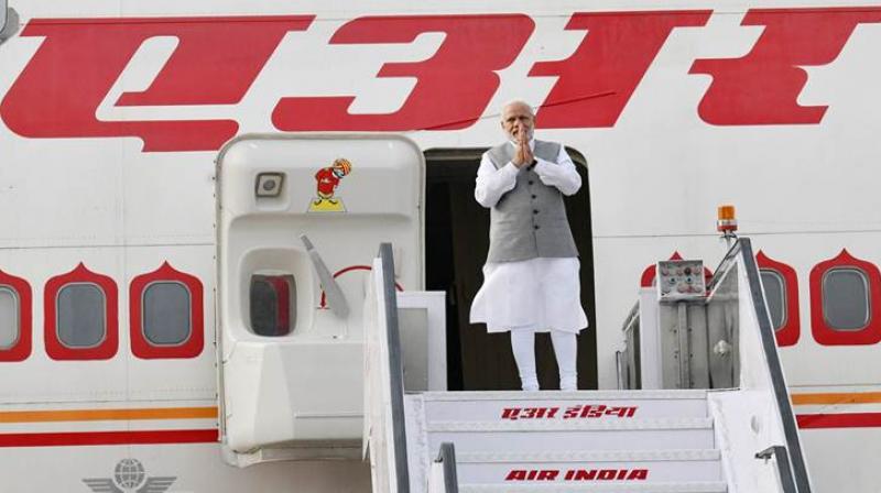 PM Narendra Modi arrives in Qingdao to attend SCO summit PM Narendra Modi arrives in Qingdao to attend SCO summit