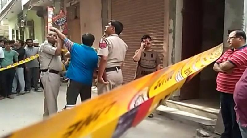 11 members of a family found dead in Delhi 11 members of a family found dead in Delhi