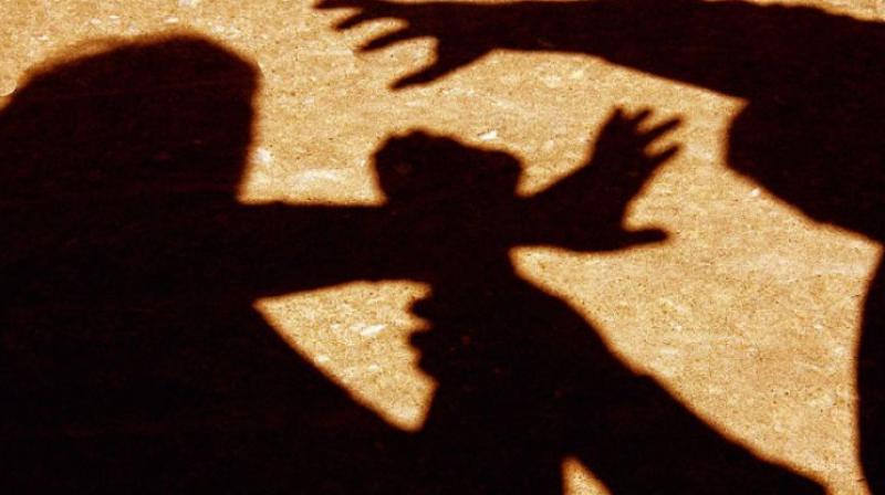 Woman paraded naked on suspicion of killing man Woman paraded naked on suspicion of killing man