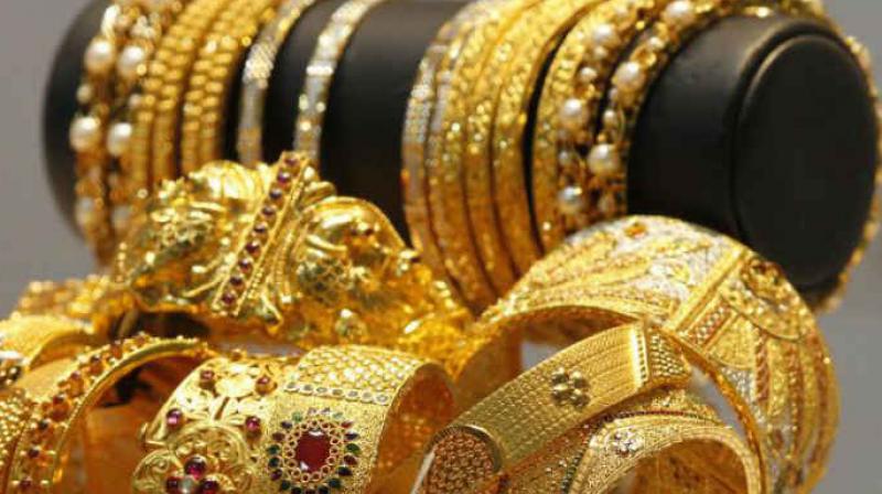 Gold, silver extend gains on global cues, jewelers' buying Gold, silver extend gains on global cues, jewelers' buying
