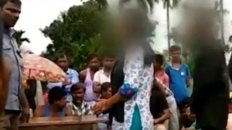 A mob waylaid an unmarried couple going on a motorcycle