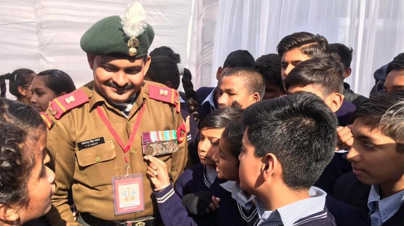 Param Vir Chakra Awardee Sub Maj Yogindra Singh Yadav interacting with school students during Saragarhi Samvadh Param Vir Chakra Awardee Sub Maj Yogindra Singh Yadav interacting with school students during Saragarhi Samvadh
