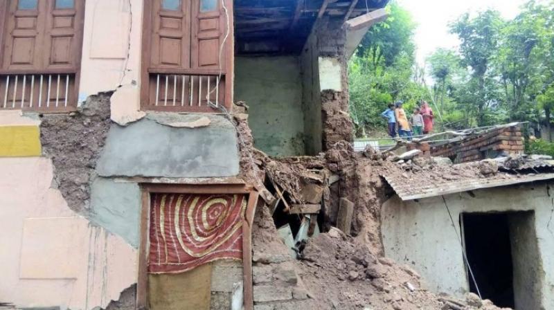 Woman, granddaughter killed in wall collapse Woman, granddaughter killed in wall collapse