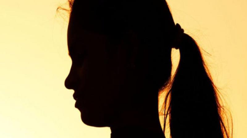 Two minor girls were found hanging from a tree Two minor girls were found hanging from a tree