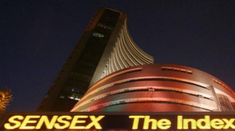 Sensex, Nifty hold on to gains