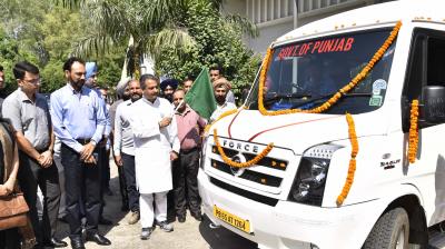 Vijayinder Singla PWD Minister Punjab flagging off a Mobile Testing Van