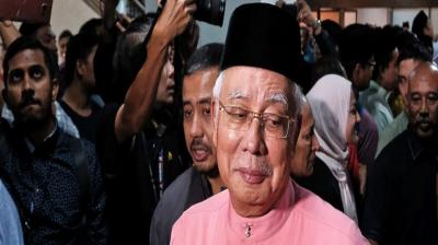 Defeated Malaysian leader Najib Razak resigns from his party