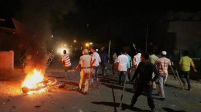 Rioters hurl stones and sticks during a communal riot in Moti Karanja area of Aurangabad