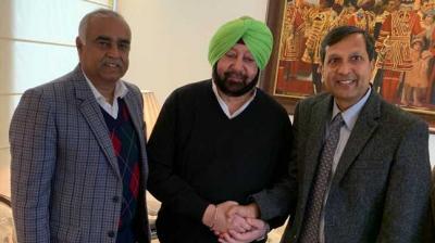 From left: Suresh Arora, Capt Amarinder Singh and Dinkar Gupta