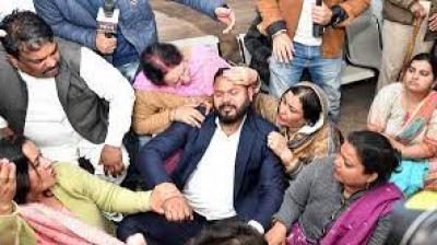 Police remove AAP workers staging hunger strike at MC office. Police remove AAP workers staging hunger strike at MC office.