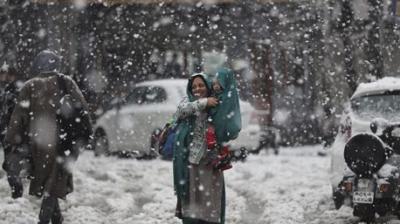 Kashmir Blanketed in Heavy Snowfall, Tourists Enjoying Beauty