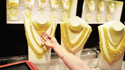 Gold rises on positive global cues