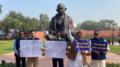 AAP Protests at Parliament's Mahatma Gandhi Statue 