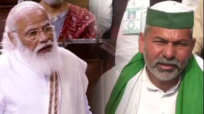 PM Modi and Rakesh Tikait