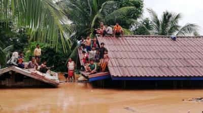 Hundreds missing in Laos after dam collapse