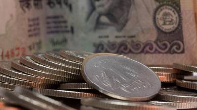 Rupee retreats from 1 month-high Rupee retreats from 1 month-high