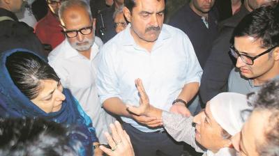 J&K Chief Minister Mehbooba Mufti with relatives of Shujaat Bukhari