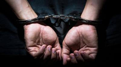 Members of outfit booked for burning Constitution's copy