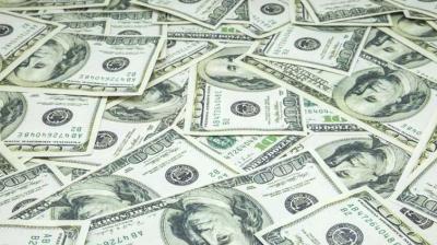 US dollar ends sharply higher against rupee