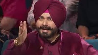 Known for his signature “Thoko Taali!” catchphrase, Sidhu resumes his iconic special-guest chair alongside long-time co-panellist Archana Puran Singh after a notable absence.File Photo.