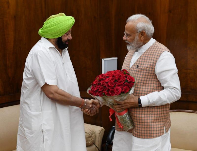 Captain Amarinder Singh and Narendra Modi