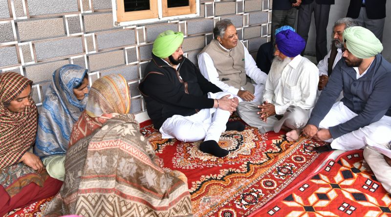 Captain Amarinder Singh sharing condolences with Darshan Singh, the father of Martyr Kulwinder Singh