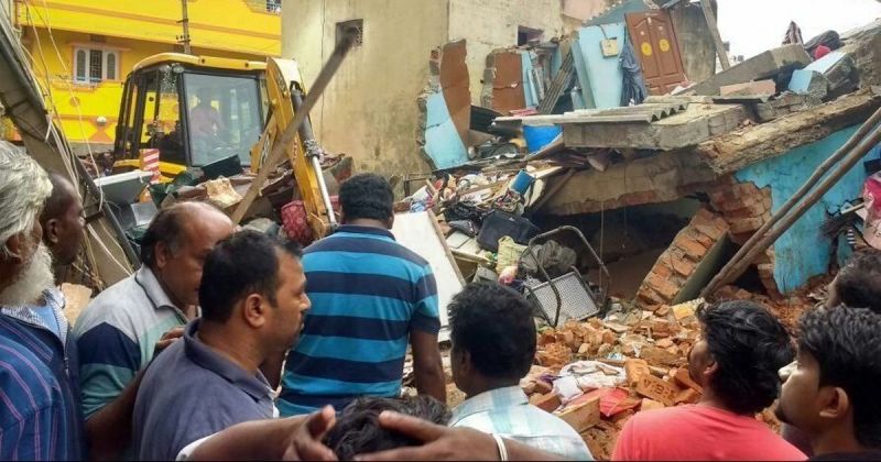 A portion of a building collapsed on an adjoining chawl