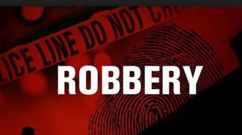 Robbing a man at gunpoint