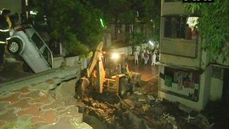 The 30-ft long compound wall of the society collapsed