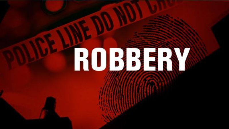 Unidentified persons today robbed Rs 35 lakh