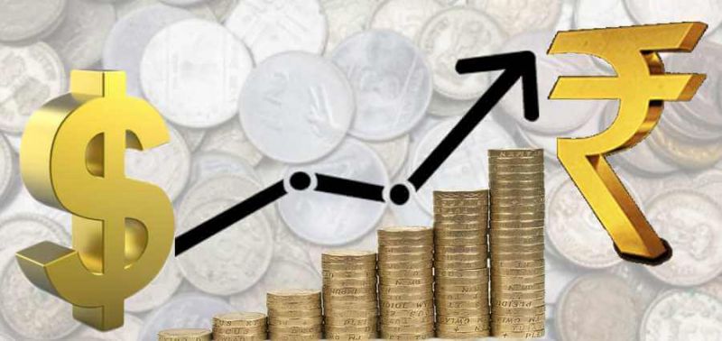 The dollar slipping from an 11-month peak against other currencies