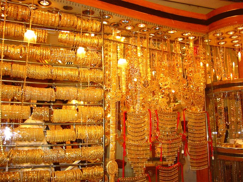 Gold rose 0.38 per cent to trade at USD 1,323.14 an ounce in Singapore
