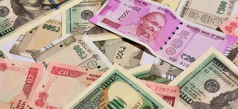 Rupee slips 14 paise against US dollar