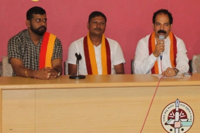 Praveen Shetty (right), an office bearer of the Karnataka Rakshana Vedike
