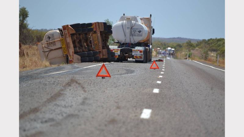 2 persons were killed when a tanker carrying chemicals skidded off the highway