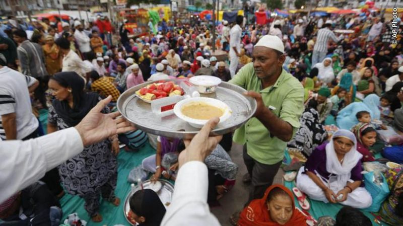 People were seen exchanging greetings and gifts and giving alms to the needy