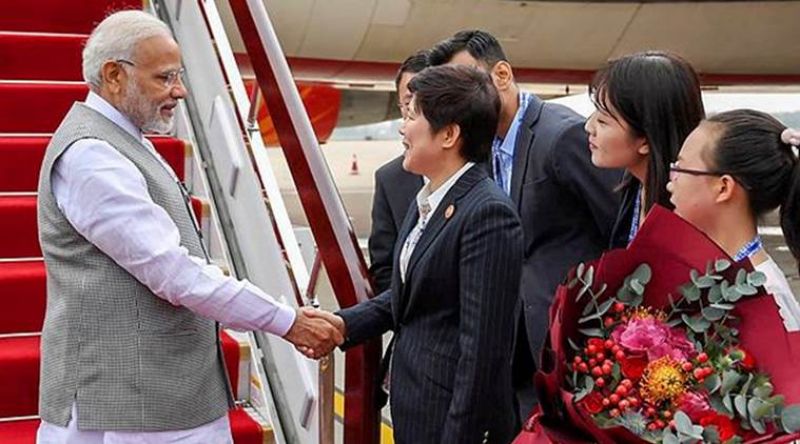 Prime Minister Narendra Modi being welcomed on his arrival at Qingdao