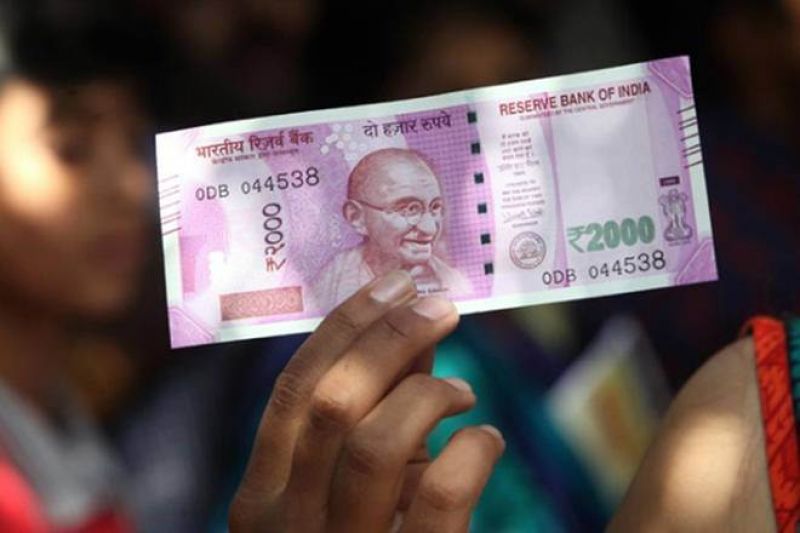 rupee hitting a new record low of 70.82 against the dollar