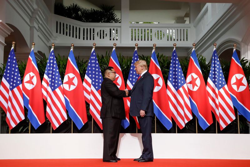 President Trump and North Korea's Kim Jong Un shake hands