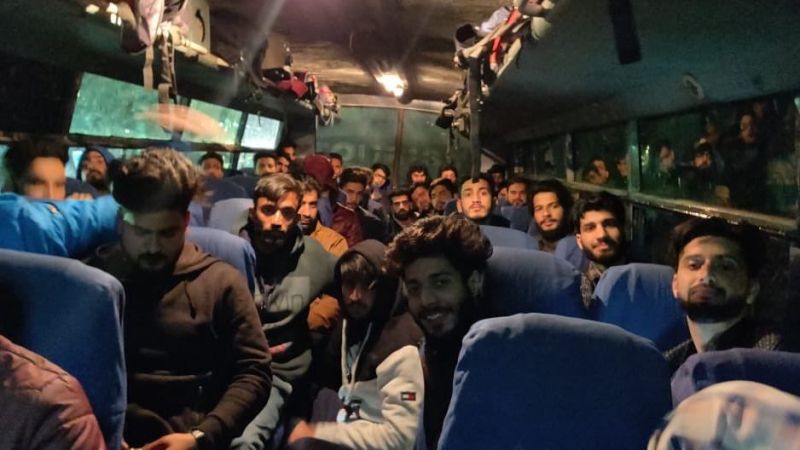 Stranded Kashmiris heading back home in a bus arranged by Khalsa Aid